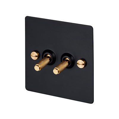 Outlet 2G toggle switch - Black / brass