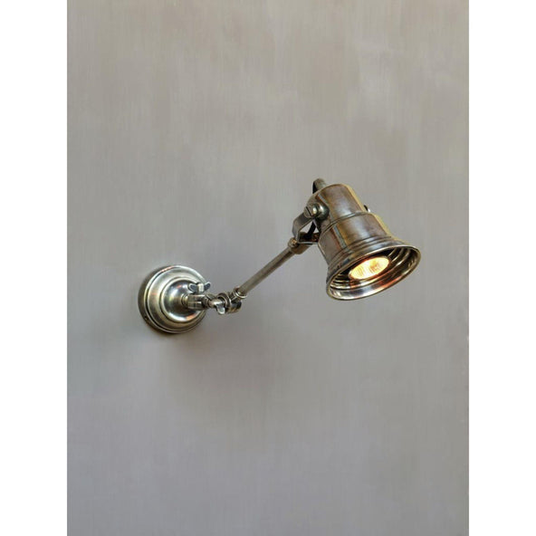 Adjustable pewter wall light